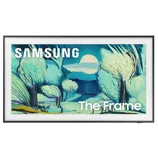 A Samsung display featuring \“The Frame\“ TV, designed to look like art with a digital painting of trees and a moonlit landscape.