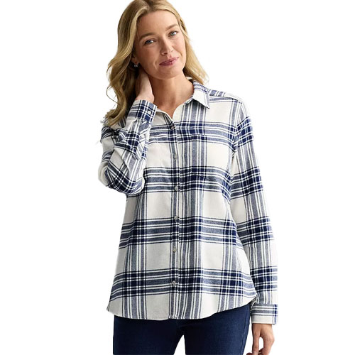 A woman is wearing a long-sleeve plaid shirt in blue and white with a button-front design and a collar.