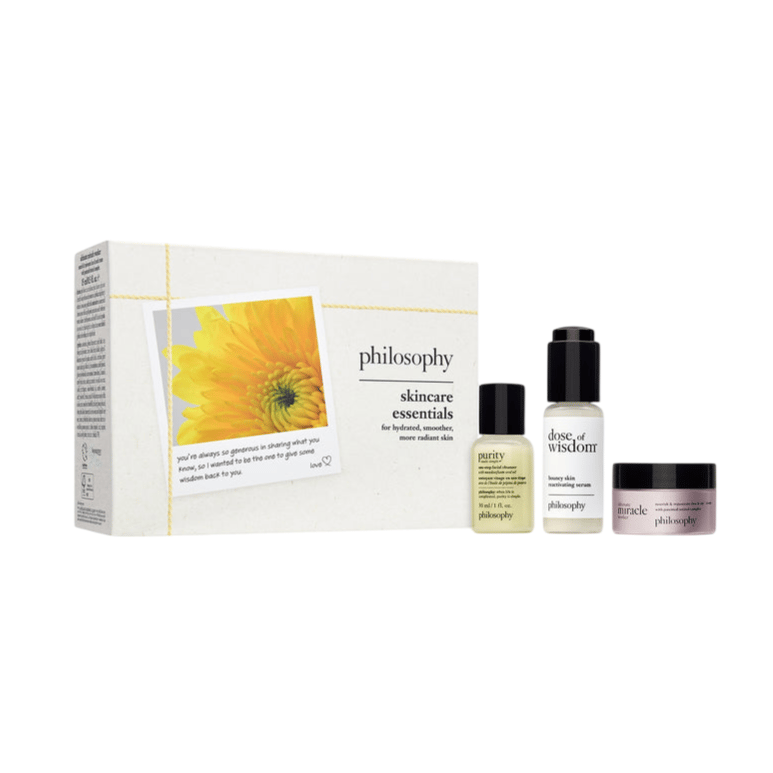 Philosophy Skincare Essentials set includes Purity Made Simple facial cleanser, Dose of Wisdom moisturizing cream, and Renewed Hope in a Jar, aimed at hydrating and smoothing skin.