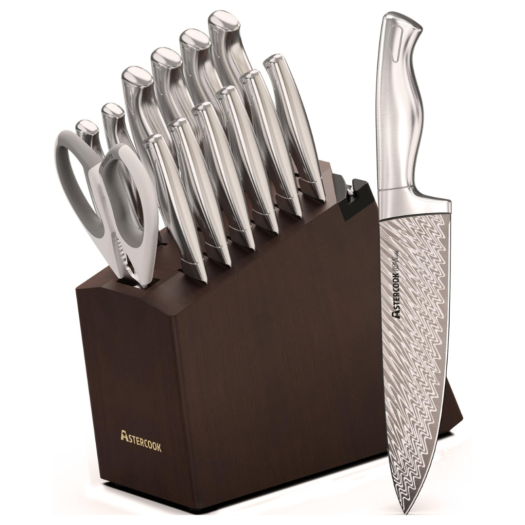 A knife set in a wooden block includes multiple stainless steel knives and kitchen shears. The visible chef's knife has a textured blade and is branded with \“AsterCook.\“
