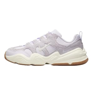 Nike Tech Hera Shoes feature a mix of light purple suede and mesh materials on the upper, with a cream-colored sculpted midsole and gum outsole, providing a stylish and cushioned design.