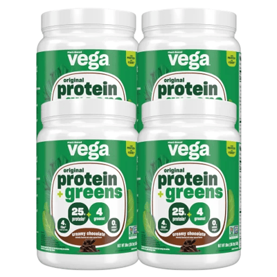 Four containers of Vega Protein + Greens in creamy chocolate flavor, each with 25g of protein, 4g of greens, and no added sugar.