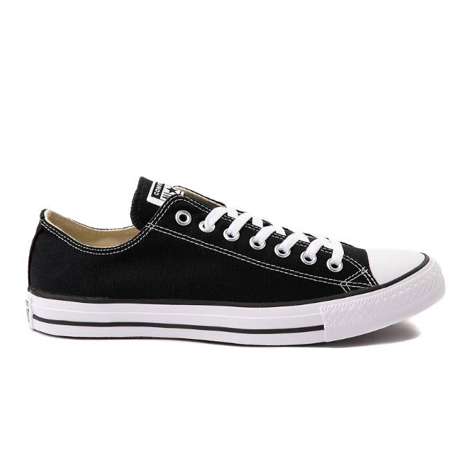 A black low-top canvas sneaker with white laces, a white rubber sole, and a round toecap.