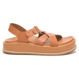 Tan sandal with cross straps and a slingback, featuring a thick platform sole.