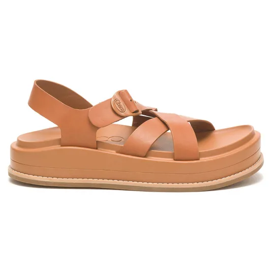 Tan sandal with cross straps and a slingback, featuring a thick platform sole.