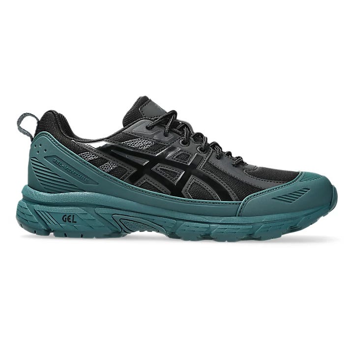 Trail running shoe with a black and teal design, featuring the ASICS logo and a GEL cushioning sole for enhanced comfort and traction.