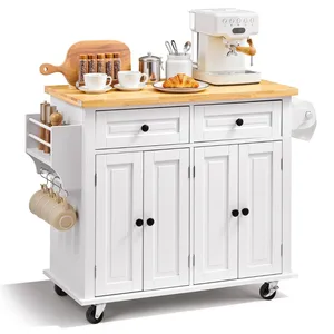 A white kitchen cart with a wooden top, featuring a coffee maker, cups, a croissant, spice jars, and storage drawers. It includes side racks for hanging cups and spices and is on wheels for easy mobility.