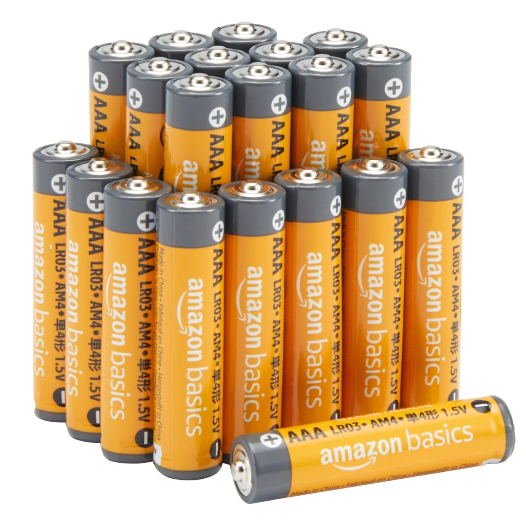 A group of Amazon Basics AAA batteries, each labeled as 1.5V, featuring a gray and orange design.