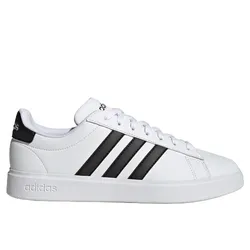 A white Adidas sneaker featuring black stripes and a low-top design with a lace-up closure. The branding is visible on the heel and tongue.