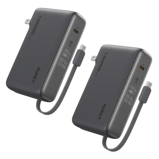 A pair of black power banks with 10,000 mAh capacity, featuring a digital display, USB-C port, and foldable plug for wall charging.
