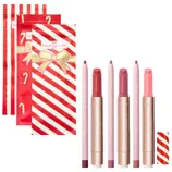 Three lip liner and Maracuja Juicy Lip Plump sets from Tarte, featuring shades of pink and red, are accompanied by festive red and white striped packaging adorned with candy cane motifs.