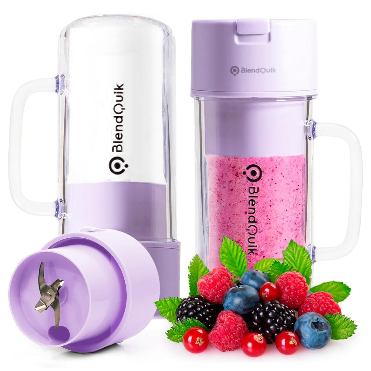 Portable blender with detachable cups, one empty and one filled with a pink berry smoothie, alongside fresh berries.