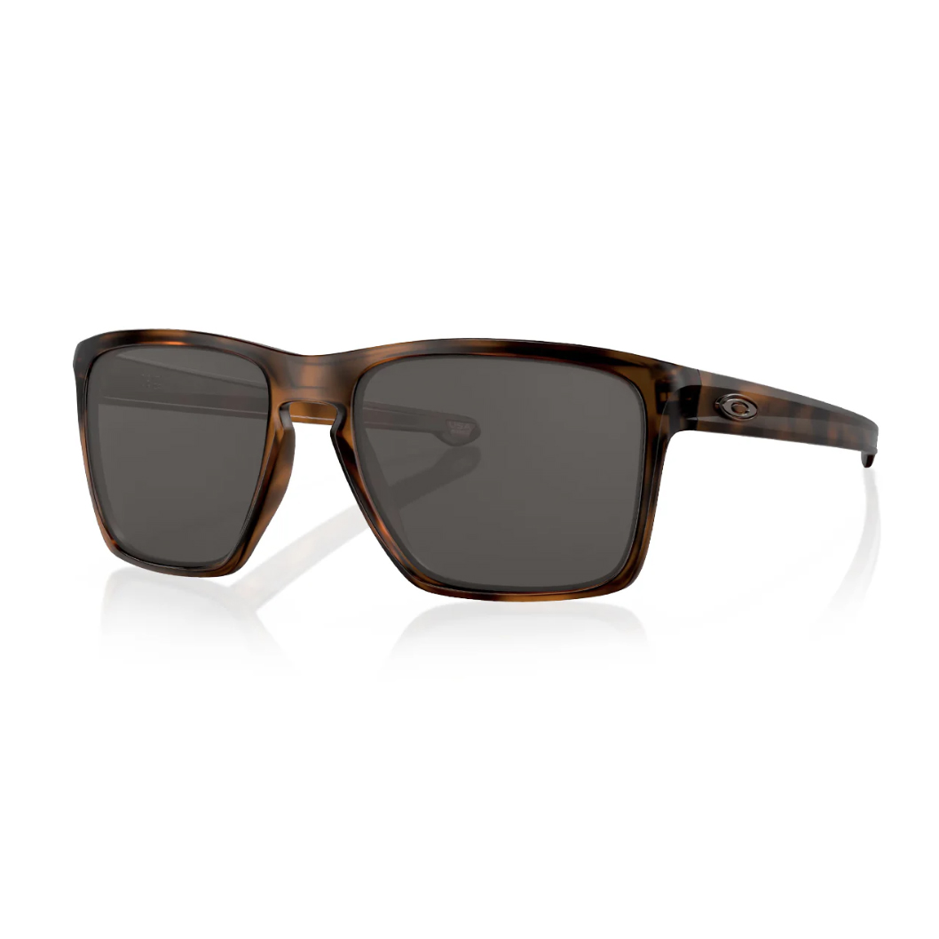 Tortoise shell sunglasses with a rectangular frame and dark lenses, featuring a subtle logo on the temple.