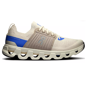 Running shoe with beige and blue accents, featuring a distinctive CloudTec sole for cushioning and stability.