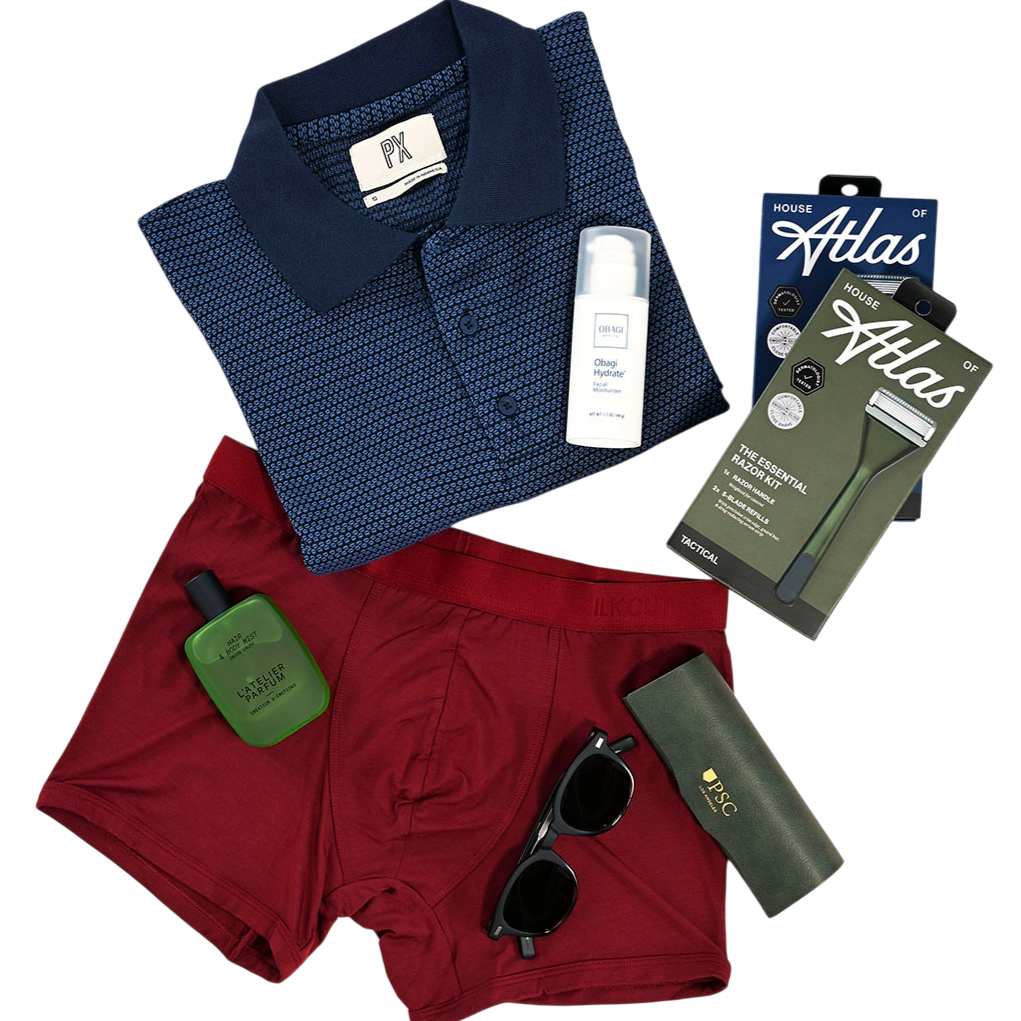 A blue polo shirt, maroon underwear, sunglasses, a green fragrance bottle, Obagi Hydrate lotion, and House of Atlas razor kits are displayed.