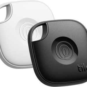 Two Tile Mate Bluetooth trackers, one black and one white, designed for finding lost items using a connected mobile app.
