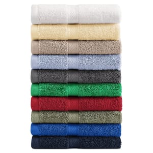 A stack of neatly folded towels in various colors, including white, cream, beige, light blue, gray, green, red, olive, royal blue, and navy blue.