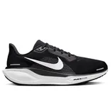 A black Nike running shoe with a white swoosh logo and a thick sole featuring Air Zoom technology.