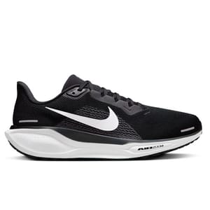 A black Nike running shoe with a white swoosh logo and a thick sole featuring Air Zoom technology.
