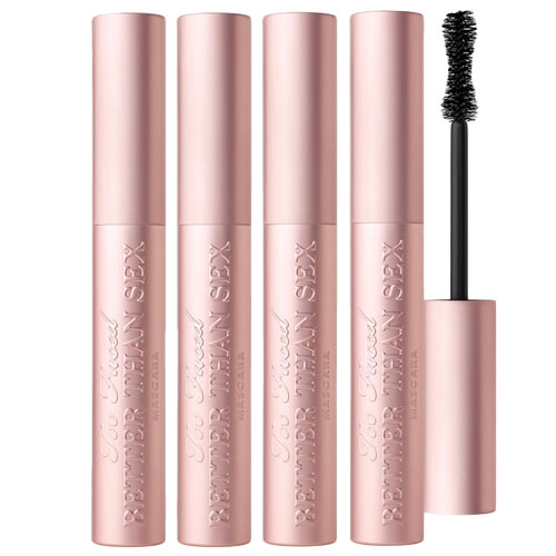 Four tubes of Too Faced Better Than Sex mascara along with an applicator brush displayed.