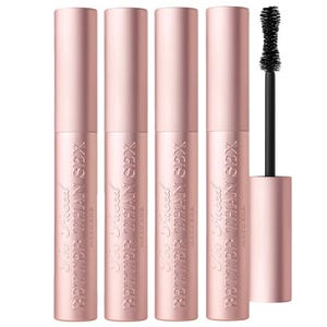 Four tubes of Too Faced Better Than Sex mascara along with an applicator brush displayed.