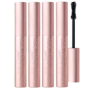 Four tubes of Too Faced Better Than Sex mascara along with an applicator brush displayed.