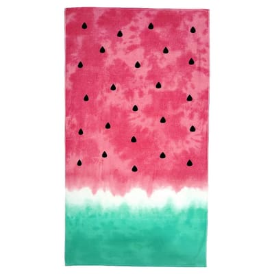 An oversized beach towel designed to resemble a watermelon, featuring a red section with black seeds, transitioning to a white band, and ending with a green base.