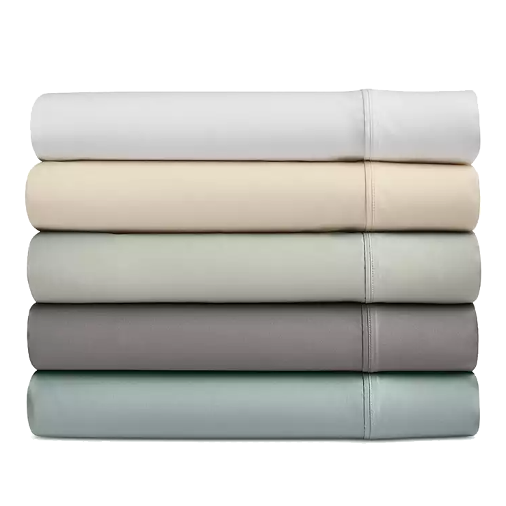A stack of five folded bedsheets in various neutral tones, including white, beige, light gray, dark gray, and light blue.