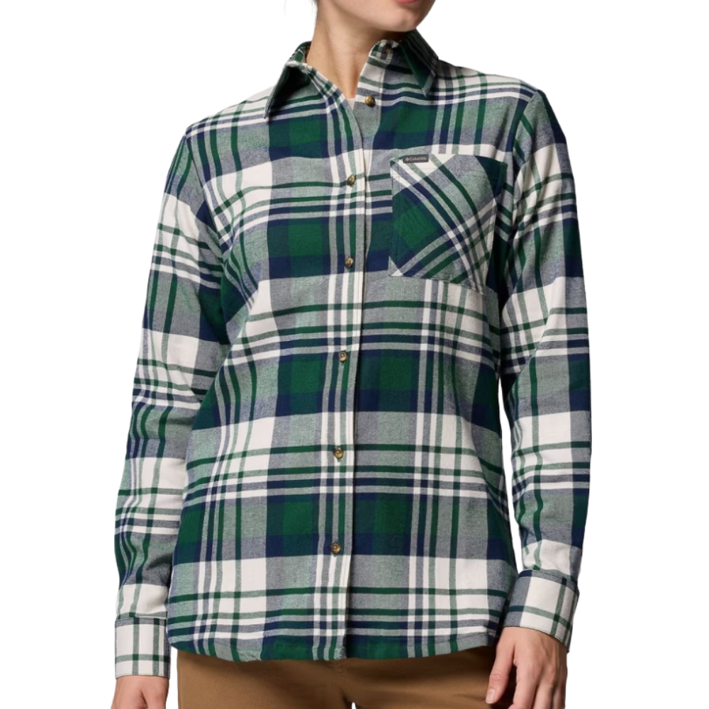 A green and white plaid flannel shirt with a chest pocket and brown buttons, paired with brown pants.