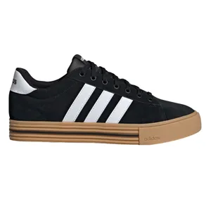 Black and white Adidas sneakers with gum soles and the iconic three stripes on the side.