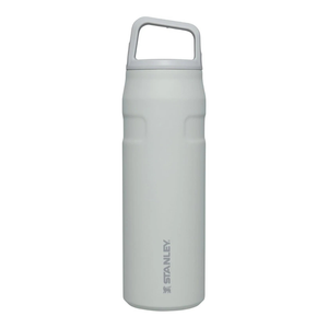 A white Stanley insulated water bottle with a handle on the lid, designed for keeping beverages hot or cold.