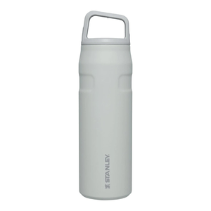 A white Stanley insulated water bottle with a handle on the lid, designed for keeping beverages hot or cold.