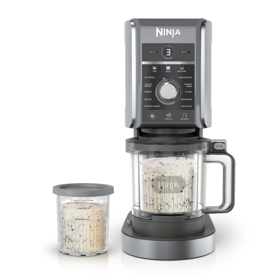 The Ninja Creami Deluxe XL is an ice cream maker featuring multiple preset functions for making ice cream, gelato, milkshakes, and more. It includes a main container and an additional storage pint for easy serving.
