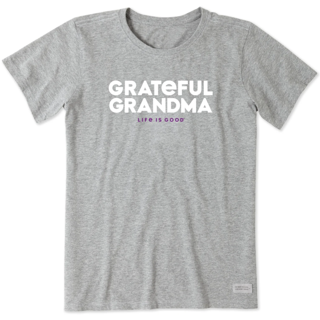 A gray T-shirt with the text \“GRATEFUL GRANDMA\“ in white and \“LIFE IS GOOD\“ in purple below it.