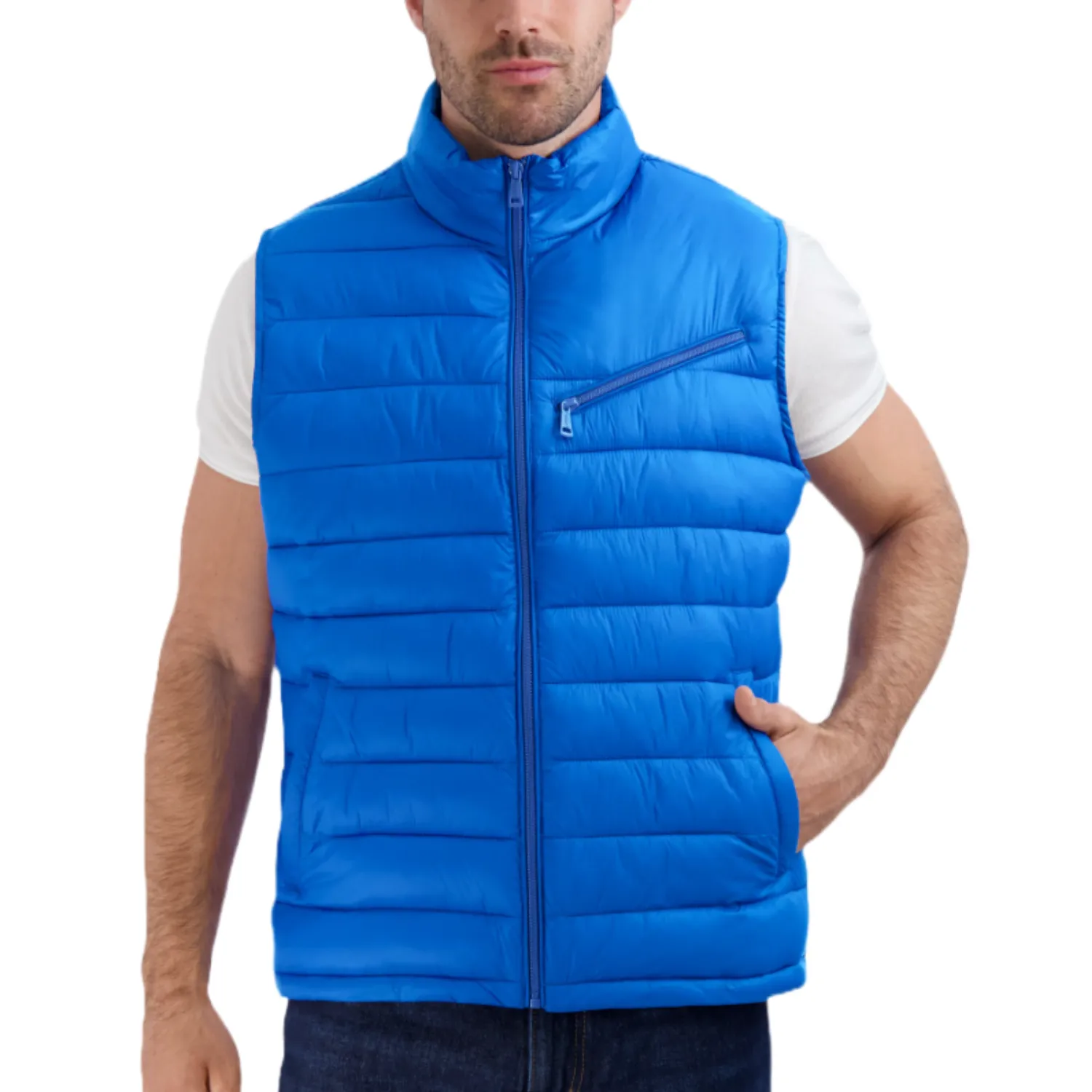 A blue, quilted vest with a front zipper, high collar, and two side pockets. It features a zippered chest pocket and is worn over a white t-shirt.