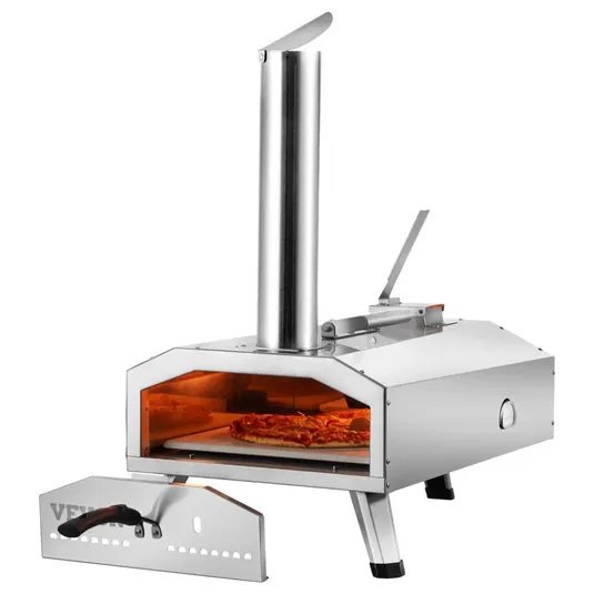A stainless steel outdoor pizza oven with a chimney, featuring a removable front panel and a pizza inside.