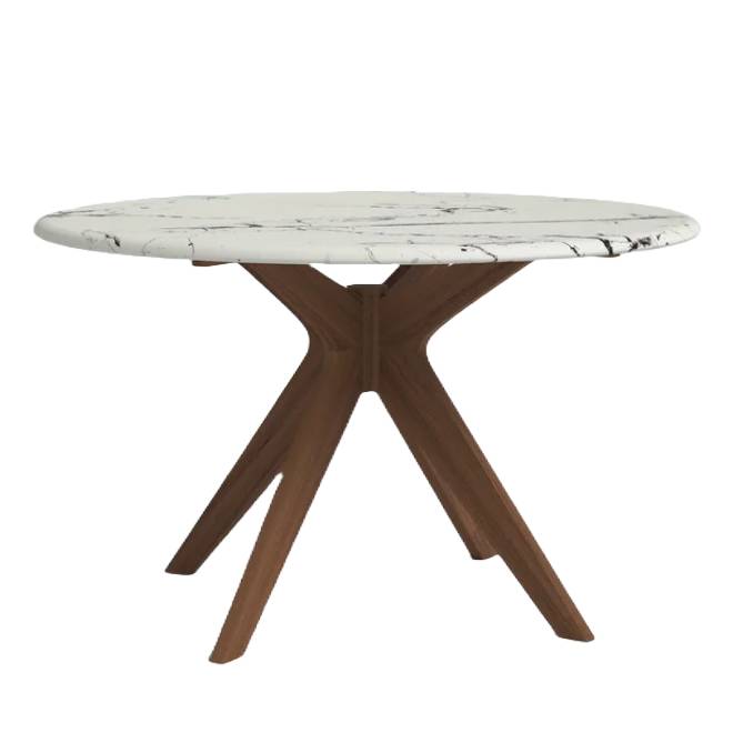 Round dining table with a white marble top and a distinctive wooden pedestal base featuring an angular, four-legged design.
