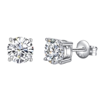 A pair of round-cut diamond stud earrings set in a four-prong silver setting, with screw-back closures.