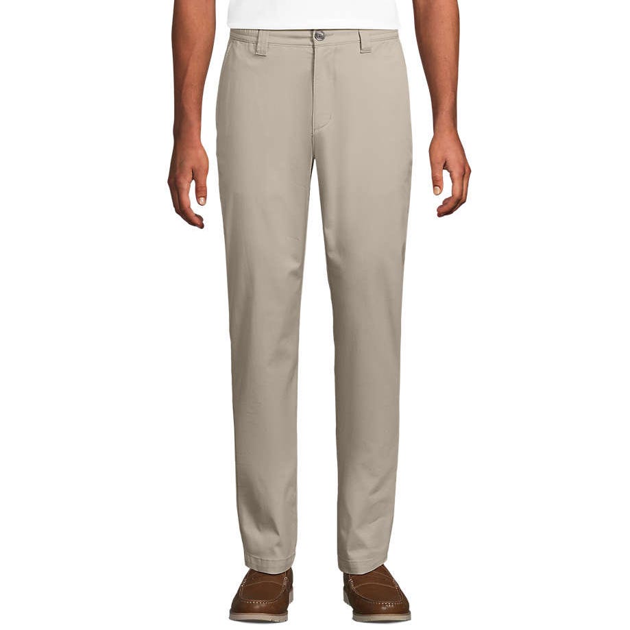 Lands' End Lightweight Relaxed Pants are beige, straight-leg trousers with a button closure and zip fly. They feature side pockets and are paired with brown loafers.