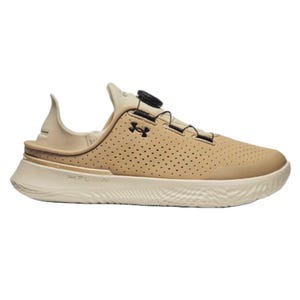UA Slip-On Training Shoes feature a tan perforated design with a white sole and a BOA lacing system for a secure fit. The shoe includes Under Armour branding and FLOW technology in the sole for traction and comfort.