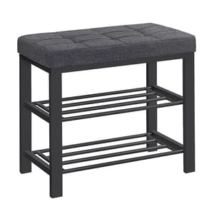 A bench with a cushioned, tufted seat and a black metal frame, featuring dual slatted shelves for storage underneath.
