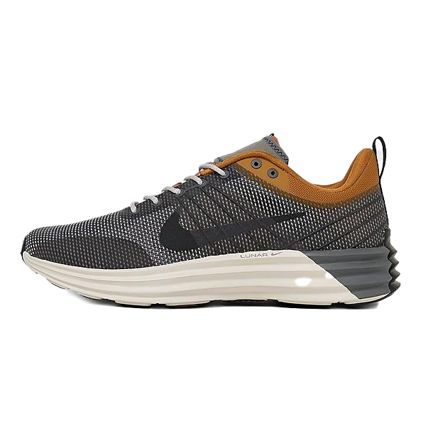 Nike Men's Lunar Roam Shoes feature a black and gray mesh upper with a brown heel accent, a black Nike Swoosh, and a white cushioned midsole. They include a pull tab at the heel for easy wearing.