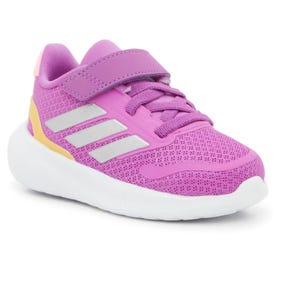 A brightly colored child's sneaker in pink and yellow with velcro straps and a breathable mesh fabric.