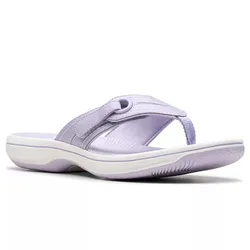 A lavender flip-flop sandal featuring a cushioned white sole and a strap with a loop detail for comfort and style.