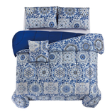 Blue and white bedding set with intricate floral patterns, featuring a comforter, two pillow shams, and a decorative pillow.