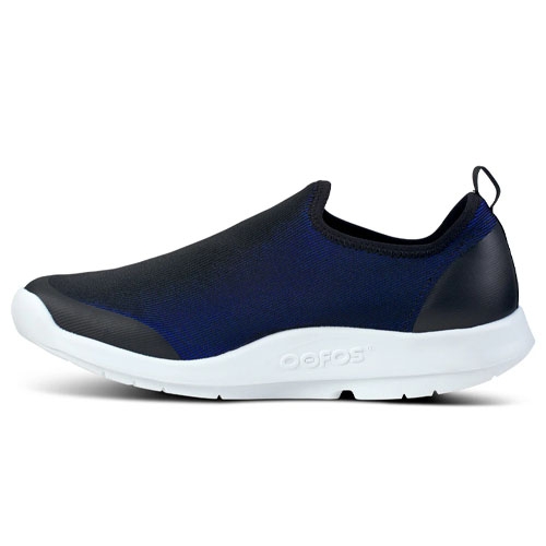 Dark blue slip-on shoe with a white sole and black accents.