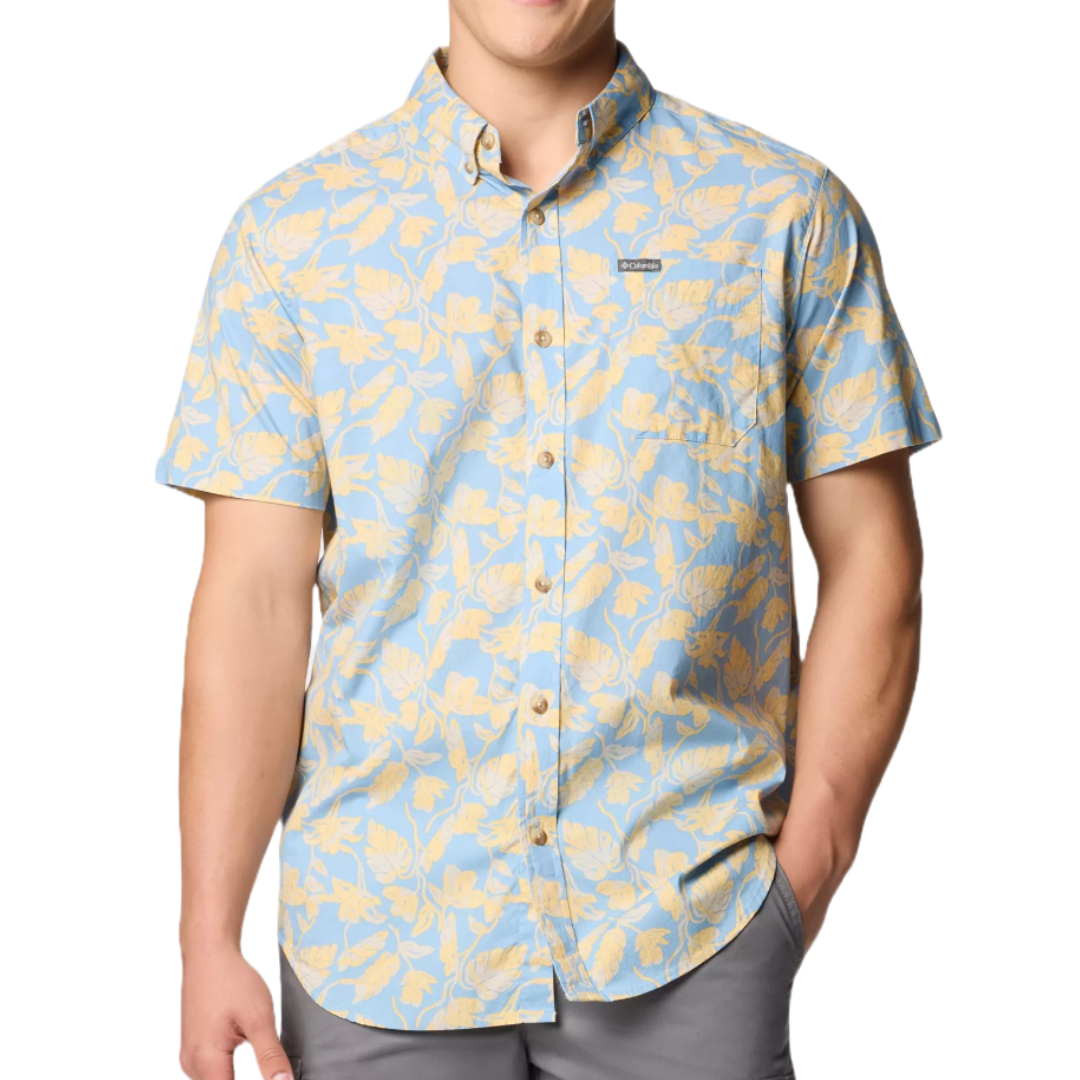 Short-sleeve button-up shirt with a light blue and yellow floral pattern, featuring a chest pocket and a small logo on the left side.