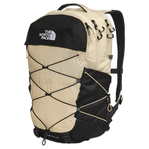 Tan and black backpack with The North Face logo, featuring multiple zipper compartments, adjustable straps, and an elastic cord system on the front for securing additional items.