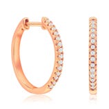 Rose gold hoop earrings adorned with small round diamonds in a pavé setting.