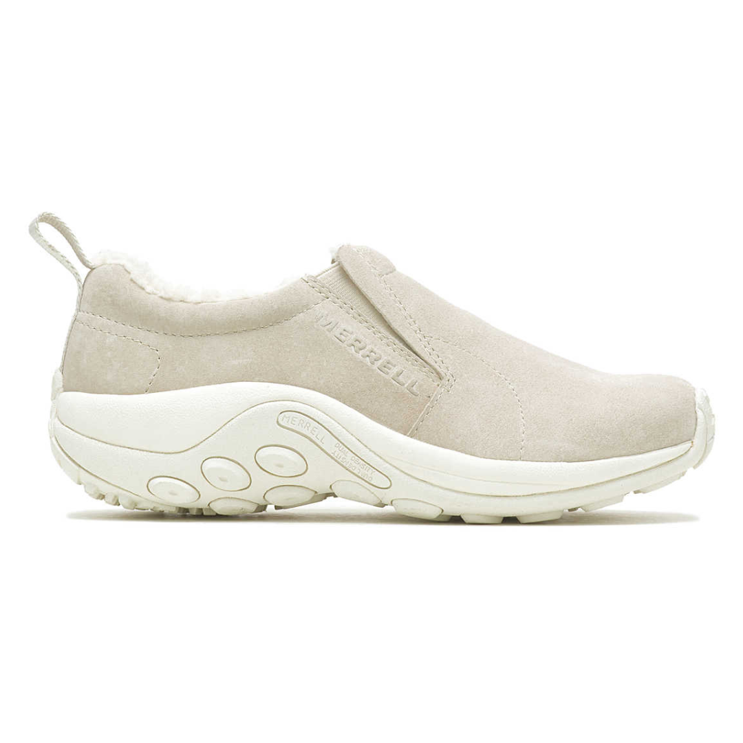 A beige slip-on shoe from Merrell with a plush interior lining and a textured white rubber sole designed for comfort and casual wear.